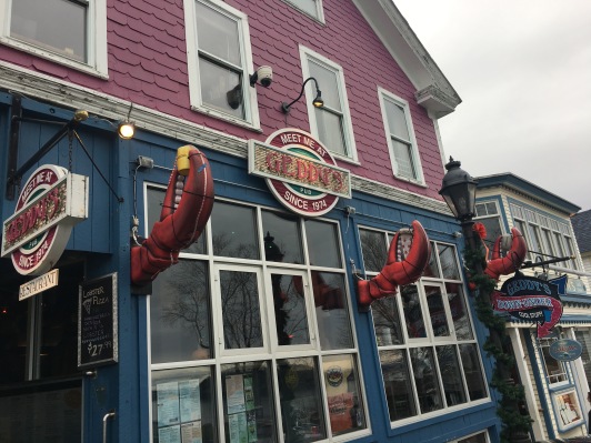 View of Geddy's Restaurant, lobster claws decorating storefront